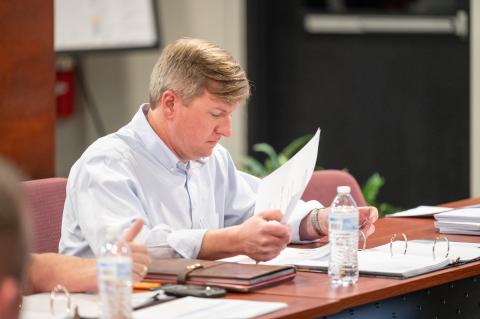 Demorest Mayor Jerry Harkness reviews paperwork on the grants. ZACH TAYLOR/Staff