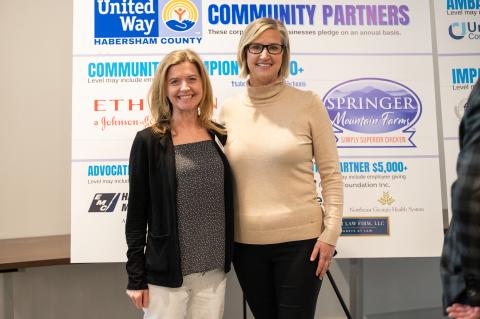 United Way Board Chairwoman Michelle Blackburn (left) stands with United Way President Candice Holcomb after the annual meeting last week. ZACH TAYLOR/Staff