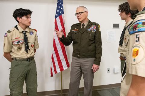 Lt. General James L. Terry speaks with David Quintal and other scouts from Troop 5 after his keynote address. ZACH TAYLOR/Staff 