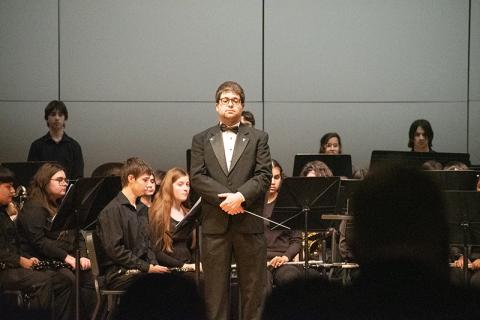Habersham Central Band Director Jacob Weinstein waits for the performance evaluators to make their comments before proceeding with the practice performance. HANNAH CAUDELL/Staff