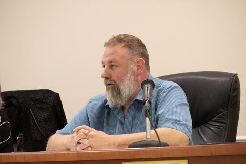 Baldwin City Councilman Maarten Venter asks some questions about the vacuum truck that the council is considering for purchase. Ultimately, the council decided to table the decision until they could further review their options. HANNAH CAUDELL/Staff