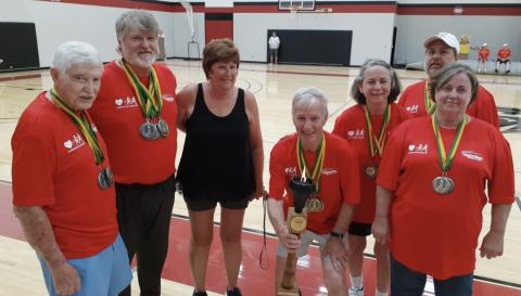  Evan Woodring, Joel Byers, Francis Welch, Robert Nichols, Patti Roy, Alan Irvin and Gayle Whitener snapped a photo after medaling in volleyball at the 2022 World Heart Games. SUBMITTED
