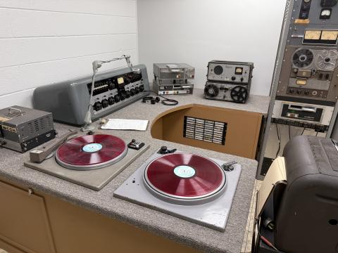 Mr. Foster led WCON to new heights amid the rapidly changing landscape of the industry. This photo depicts what the station’s equipment set up looked like back in its infancy ...
