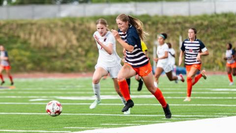 Habersham's Emmie Kyle beats a Lee County defender to the punch during the Lady Raiders' first round matchup. HABERSHAM SOCCER