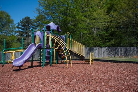 At Alto’s Lee Dorsey Cook playground, the old fence stands in the background of the attractions. The Alto Town Council just elected to replace the fence with black chain link, costing the town a total of $21,215. HANNAH CAUDELL/Staff