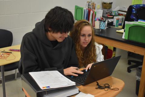 Habersham Success Academy Teacher Candace Carver (right) helps one of her students, Alejandro Rodriguez (left) on an early morning at the Habersham Success Academy. Carver is this year’s Teacher of the Year for the Habersham County School district, an honor she says is humbling. SAMANTHA SINCLAIR/Staff