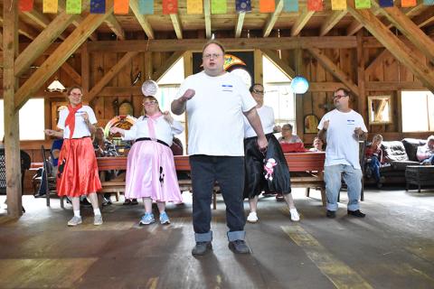 Scott Raven does his famous rendition of ‘I’m All Shook Up’ by Elvis Presley, while other Dream Weavers in slicked-back hair and poodle skirts dance in the background to kick off the Dream Weavers 25 year celebration. HANNAH CAUDELL/Staff