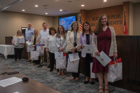 From right to left, these aspiring principals include Jennifer Adams of Fairview Elementary School, Kellie Cash of Demorest Elementary School, Stefanie Eaton of Level Grove Elementary School, Xan Noggle of Baldwin Elementary School, Joy Phillips of Woodville Elementary School, Bradley Johnson of Wilbanks Middle School, Lindsey Shafer of Habersham Central High School, Kevin Weems of Habersham Ninth Grade Academy, and Sandy Todd of Hazel Grove Elementary School. HANNAH CAUDELL/Staff
