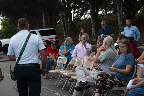 Tom Whitney, a resident of Baldwin, addresses the crowd to say that there needs to be more trust between the Baldwin City Council and the residents that live within the city limits. HANNAH CAUDELL/Staff