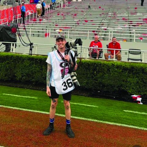 UBMITTED Landen Todd covers a football game for The Red & Black.