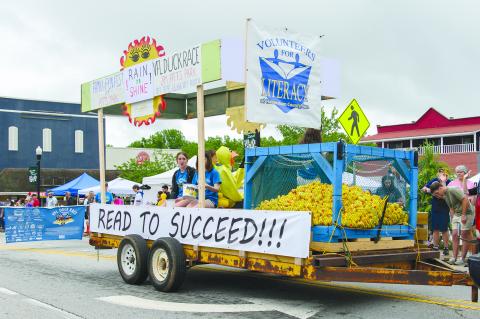 The Mountain Laurel Festival kicks off with the Lion’s Club Parade on Saturday, May 17 with marchers and floats, like last year’s Volunteers for Literacy float escorting thousands of rubber ducks through downtown Clarkesville. File 