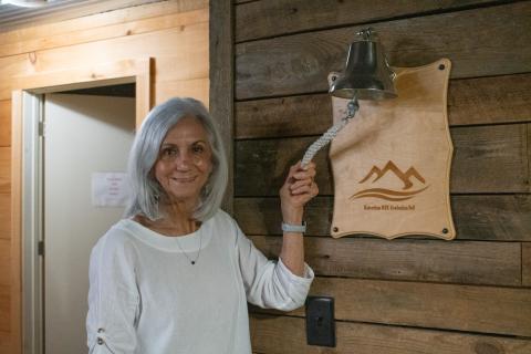 Myra Chandler rings the graduation bell at Mountain Education in Habersham. Chandler has celebrated her own graduation of sorts after retiring from Mountain Education after 16 years of counseling at the school, and a career in education and counseling that spans 54 years in total. Chandler is still involved with the school in a public relations role. HANNAH CAUDELL/Staff