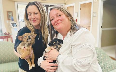 cilwoman Alice Venter and pose with puppies in February 2023. (File)