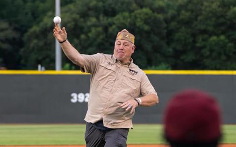 Georgia Department of Veterans of Foreign Wars Commander Bill Miles throws the first pitch at the Macon Bacon home game on Tuesday. (Lena Shoemaker/Macon Bacon)