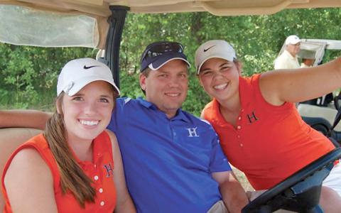 Coach Shawn Blackburn and former HCHS golfer Alex Oren pose at the Region Championship at Double Oaks Golf Course in 2011. The team finished as Region Runner Up and made it to State for only the second time in school history. Ashley Blackburn and Oren were Shawn Blackburn’s first two who played at the collegiate level at Truett McConnell. (File)