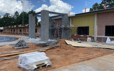 The construction of a secure entrance vestibule is underway at Woodville Elementary School before the building opens back up for student instruction on Aug. 8. (Submitted)