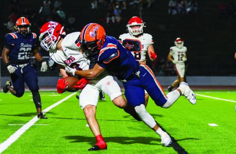 Habersham Central junior Tay Spencer (9) makes a tackle during a high school football game between Stephens County and Habersham Central at Raider Stadium on Friday, Aug. 15. The Raiders won 27-3. (Landen Todd/Staff)
