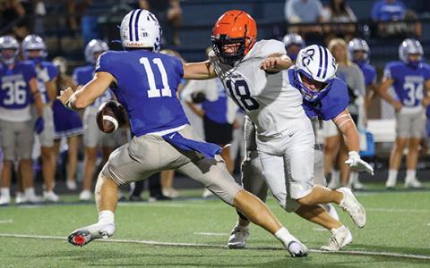 Habersham Central senior Jackson Adams (18) goes after the quarterback during a scrimmage between Habersham Central and Oconee County at Oconee County High School on Friday, Aug. 1. (Landen Todd/Staff)
