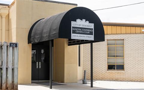 Demorest residents expressed concerns about cutting down the more than 100-year-old trees in front of city hall – the former Demorest Elementary School – during presentations of landscaping, engineering for a parking lot and interior concepts to move the Demorest Post Office into the building.  (File)