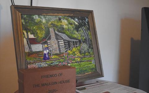 Clarkesville’s Historic Mauldin House and Gardens is working to preserve the city’s history by gathering information, items and funds. Those sharing historical information will be entered into a drawing to win artwork by Frankie Walters, like the piece above. People may also purchase bricks to support the preservation of the property. (Samantha Sinclair/Staff)