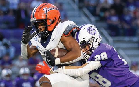 Habersham Central senior running back Donnie Warren (0) runs through defenders during a football game between Habersham Central and Cherokee Bluff at Bear Stadium on Friday, Sept. 5. (Landen Todd/Staff)