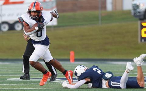 Habersham Central senior running back Donnie Warren (0) runs past a defender during a football game between Habersham Central and White County at Warrior Stadium on Friday, Aug. 29. The Raiders won 17-3. (Landen Todd/Staff)
