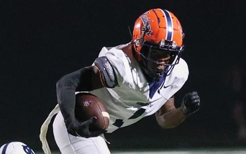Habersham Central senior wide receiver Tylon Davis (1) runs after a catch during the football game between Habersham Central and White County at Warrior Stadium on Friday, Aug. 29. (Landen Todd/Staff)