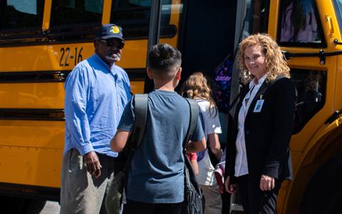 Habersham County School Bus Driver Verner Kesler (left) greets children who board the bus after a Monday school day at Cornelia Elementary. Transportation Director Stephanie Walker (left) is also there to greet students. (Hannah Caudell/Staff)