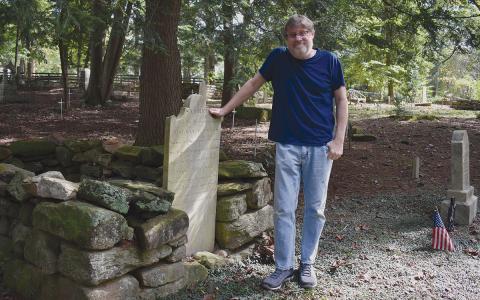 Local historian Jim Betz stands at the final stop on his Haunted Habersham ghost tours, the Old Clarkesville Cemetery. (Samantha Sinclair/Staff)