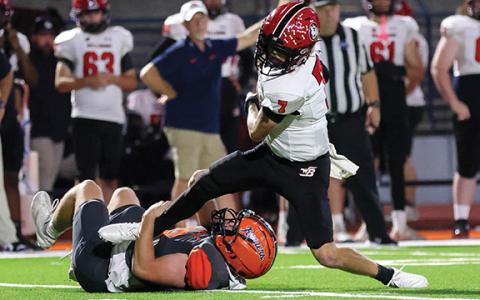 Habersham Central senior lineman Jackson Adams (18) sacks the quarterback during a game between Winder-Barrow and Habersham Central at Raider Stadium on Friday, Sept. 26. (Landen Todd/Staff)
