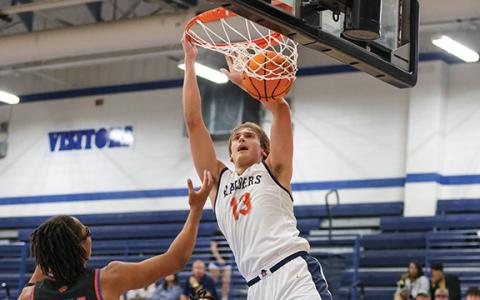 Habersham Central senior forward Judge Wilbanks (13) dunks the ball during the Tip-Off Showcase between Habersham Central and Cedar Shoals at Banks County High School on Saturday, Nov. 8. (Landen Todd/Staff)