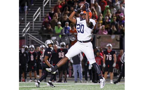Habersham Central junior linebacker Griffin Cunningham (20) snags an interception during a football game between Habersham Central and Jackson County for the region championship at Panther Stadium on Friday, Oct. 31. (Landen Todd/Staff)