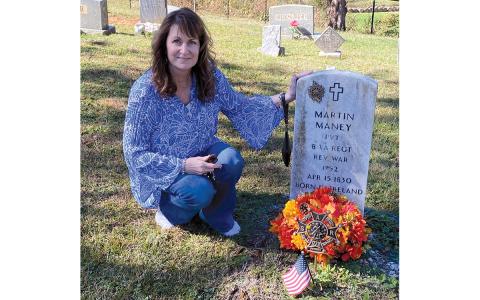 Mona Rumsey visits the grave of her Revolutionary War ancestor Martin Maney in Buncombe County, N.C., in October 2023. (Submitted)