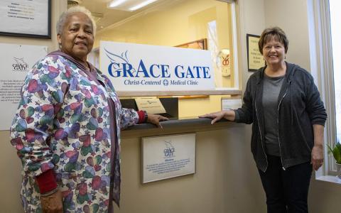 From left, Clinic Manager Barbara Blackwell, a familiar face at Grace Gate,  smiles with brand new Executive Director Pam Hendrix, who hopes to lead the nonprofit in its future goals while maintaining the legacy of the leaders who came before her. (Hannah Caudell/Staff)