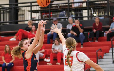 Habersham Central sophomore Sadie Chambers (13) shoots the ball during the region tournament at Winder-Barrow High School on Thursday, Feb. 19. (Landen Todd/Staff)