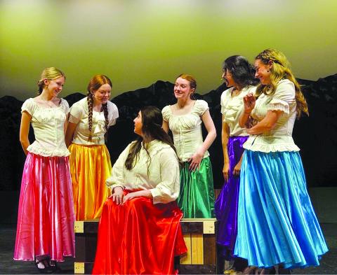 The brides (Sari Elliott, Elloree Chambers, Ashley Jones, Kayla Rummel and Annalee Lewis) gather around Milly played by Aliyah Duncan. (Callie Cueva/Staff)
