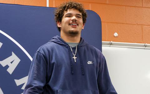Habersham Central senior offensive lineman and wrestler Javonte Bowen gives a speech at his signing ceremony at Habersham Central High School on Wednesday, Feb. 18. (Landen Todd/Staff)