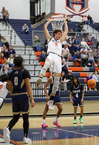 Habersham Central senior forward Jake Mihalick (5) dunks the ball during a basketball game between Apalachee and Habersham Central. Mihalick has committed to play basketball with North Greenville University. (LANDEN TODD/Staff)