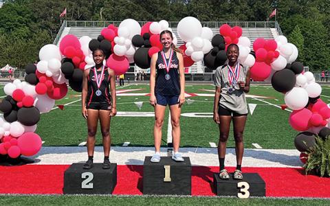 Sadie Chambers, center, was the region champion in the girls high jump at Loganville High School in the region track meet on Thursday, April 23. (Submitted)