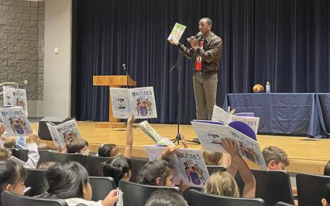 Former Georgia Bulldogs football star and NFL wide receiver Malcolm Mitchell visited Habersham County’s second graders on Tuesday to share his children’s book, The Magician’s Hat, with students. (Hannah Caudell/Staff)