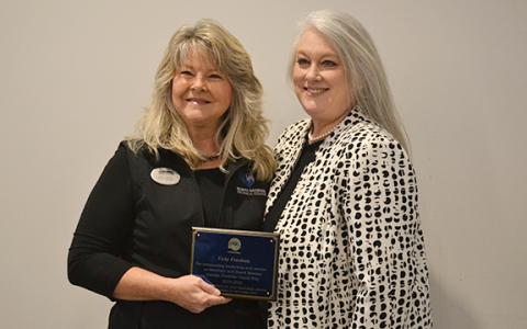Vicky Frankum and Georgia Foothills United Way President and CEO Shelby Ward smile for a photo after the organization honored Frankum with an award for her time serving as the United Way secretary and board member for seven years. (Hannah Caudell/Staff)