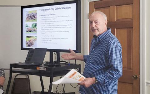 Clarkesville Councilman Brad Coppedge shows the challenges the debris pickup program faces during a presentation to council at its work session Tuesday night. (Samantha Sinclair/Staff)