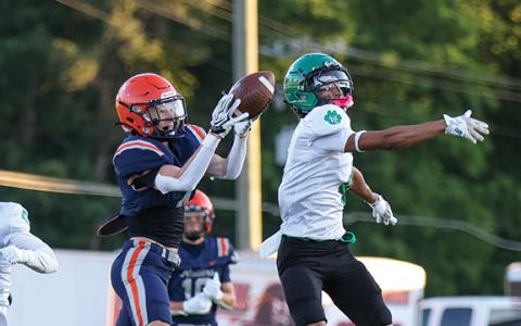 Habersham Central rising senior Parks York (4) makes a jumping grab during a football scrimmage between Franklin County and Habersham Central at Raider Stadium on Friday, May 15. (Landen Todd/Staff)