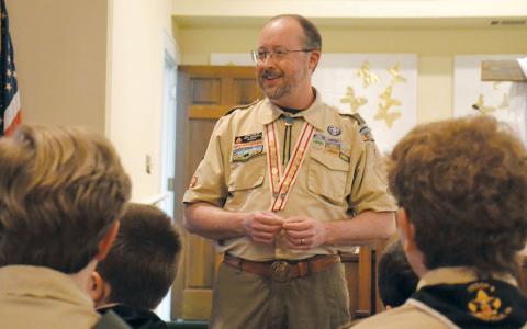 Jake McGahee speaks to Troop 5 during his final Scoutmaster Minute at the May Court of Honor on May 5. (Samantha Sinclair/Staff)