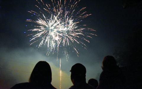 Fireworks explode high above the ballfield as firefighters and their families got front row seats to the show at Demorest’s Glorious Fourth of July last year. (Samantha Sinclair/Staff)