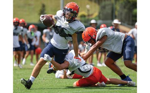 Habersham Central rising sophomore Beckett Tench runs with the ball during the FCA Camp at Piedmont University on Wednesday, July 15. (Landen Todd/Staff)