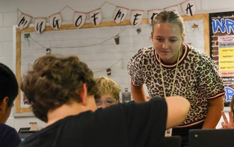 PresLee Hix, an English Language Arts co-teacher at South Habersham Middle School, helps one of her students with an assignment during class Wednesday. (Hannah Caudell/Staff)
