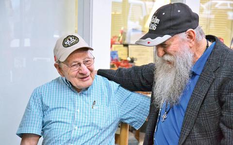 Billy Burrell chats with John A. Harris at his 90th birthday in 2020. (File)