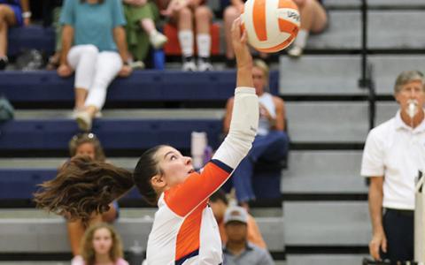 Habersham Central sophomore Leah Williams (7) attacks the ball during a volleyball match between Banks County and Habersham County at the Raider Gymnasium on Tuesday, Aug. 18. Williams had eight kills and one ace against Walnut Grove on Thursday, Sept. 10. (Landen Todd/Staff)