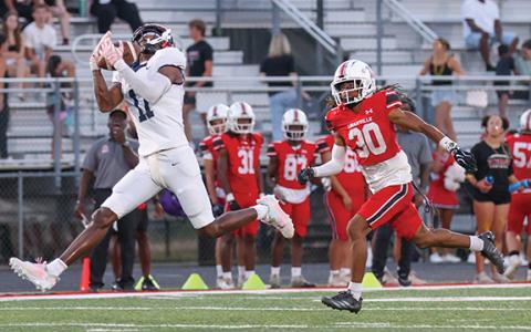 Habersham Central senior wide receiver Jay Feltus (11) catches the ball and takes it to the house during a high school football game between Habersham Central and Loganville at Red Devil Stadium on Friday, Sept. 18. (Landen Todd/Staff)